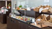 a buffet line with a lot of food on display at arte Hotel Krems in Krems an der Donau