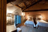 Posteľ alebo postele v izbe v ubytovaní Castello di Buttrio