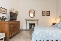 A bed or beds in a room at Cristina Rossi Bed&Breakfast