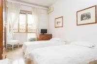 A bed or beds in a room at Cristina Rossi Bed&Breakfast