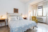 A bed or beds in a room at Cristina Rossi Bed&Breakfast