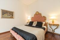 A bed or beds in a room at Cristina Rossi Bed&Breakfast