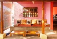 a living room with a couch and a table at Dickman Resort "The Boutique Hotel" in Negombo