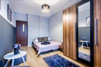 Posteľ alebo postele v izbe v ubytovaní ClickTheFlat Tamka Street Apart Rooms