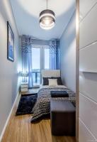 Posteľ alebo postele v izbe v ubytovaní ClickTheFlat Tamka Street Apart Rooms