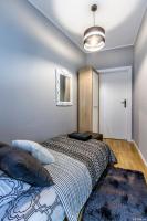 Posteľ alebo postele v izbe v ubytovaní ClickTheFlat Tamka Street Apart Rooms