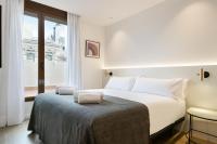Postel nebo postele na pokoji v ubytování Vale Suites