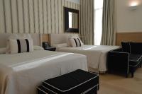 Postel nebo postele na pokoji v ubytování Gran Hotel Sardinero
