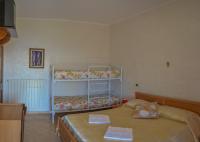 A bed or beds in a room at Casa Lieta