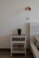 Posteľ alebo postele v izbe v ubytovaní Ostia Holiday Mykonos