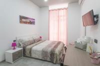 A bed or beds in a room at La Casa di Luna