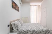 A bed or beds in a room at La Casa di Luna