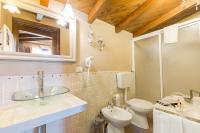 Kúpeľňa v ubytovaní Hotel Villa Calandrino