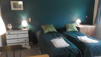 Postel nebo postele na pokoji v ubytování Djurs-BnB - Rimsøhuset