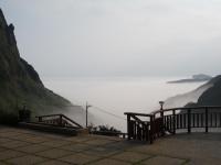 a misty view of a mountain with a view of the ocean at Formosa Arcadian Villa in Jiufen