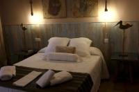 Postel nebo postele na pokoji v ubytování Palacio Doñana , Rural & Luxury