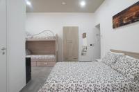 A bed or beds in a room at La Casa di Luna
