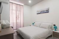 A bed or beds in a room at La Casa di Luna