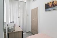 A bed or beds in a room at La Casa di Luna