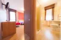 Posteľ alebo postele v izbe v ubytovaní Hotel Albi