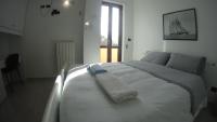 Posteľ alebo postele v izbe v ubytovaní GoodStay Casa Tati