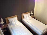Postel nebo postele na pokoji v ubytování Hotel Destination 21