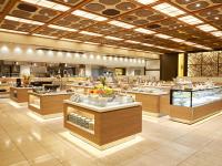 a restaurant with a large kitchen with many counters at Hotel Green Plaza Hakone in Hakone