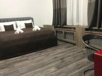Postel nebo postele na pokoji v ubytování Old Town Boutique Apartments