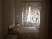 Posteľ alebo postele v izbe v ubytovaní B&B Via Fontana Milano
