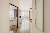Łóżko lub łóżka w pokoju w obiekcie Apartament Poniatowskiego - Komfortowe Noclegi