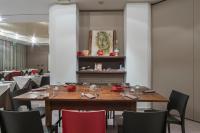 Reštaurácia alebo iné gastronomické zariadenie v ubytovaní El Patio Hotel