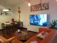 TV a/nebo společenská místnost v ubytování Jie Apartment