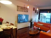 TV a/nebo společenská místnost v ubytování Jie Apartment