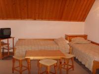 Postel nebo postele na pokoji v ubytování Family Hotel Markony