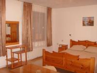 Postel nebo postele na pokoji v ubytování Family Hotel Markony