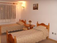 Postel nebo postele na pokoji v ubytování Family Hotel Markony