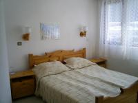 Postel nebo postele na pokoji v ubytování Family Hotel Markony