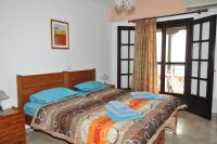 Posteľ alebo postele v izbe v ubytovaní Giannis Maria Apartments