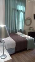 Posteľ alebo postele v izbe v ubytovaní Megaron11 Apartments