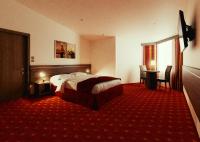 Posteľ alebo postele v izbe v ubytovaní Hotel Centrum Sosnowiec