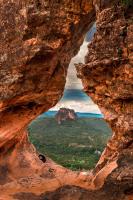 a view from a cave in a rock formation at New Center Hotel in Carolina