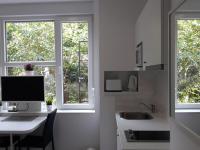 Kuchyňa alebo kuchynka v ubytovaní Haustor Apartments