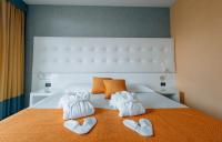 Łóżko lub łóżka w pokoju w obiekcie Hotel Viest