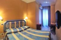 Posteľ alebo postele v izbe v ubytovaní 939 Hotel