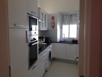 Kuchyň nebo kuchyňský kout v ubytování Cândido Reis Apartments