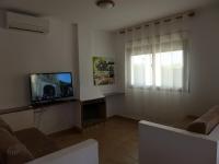 TV a/nebo společenská místnost v ubytování Rentalmar Villa California