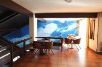 Televízia a/alebo spoločenská miestnosť v ubytovaní Hotel Rural & Spa Las Nubes