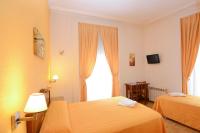 A bed or beds in a room at Hostal Edreira