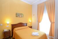 A bed or beds in a room at Hostal Edreira