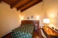 Posteľ alebo postele v izbe v ubytovaní Hotel Conteverde